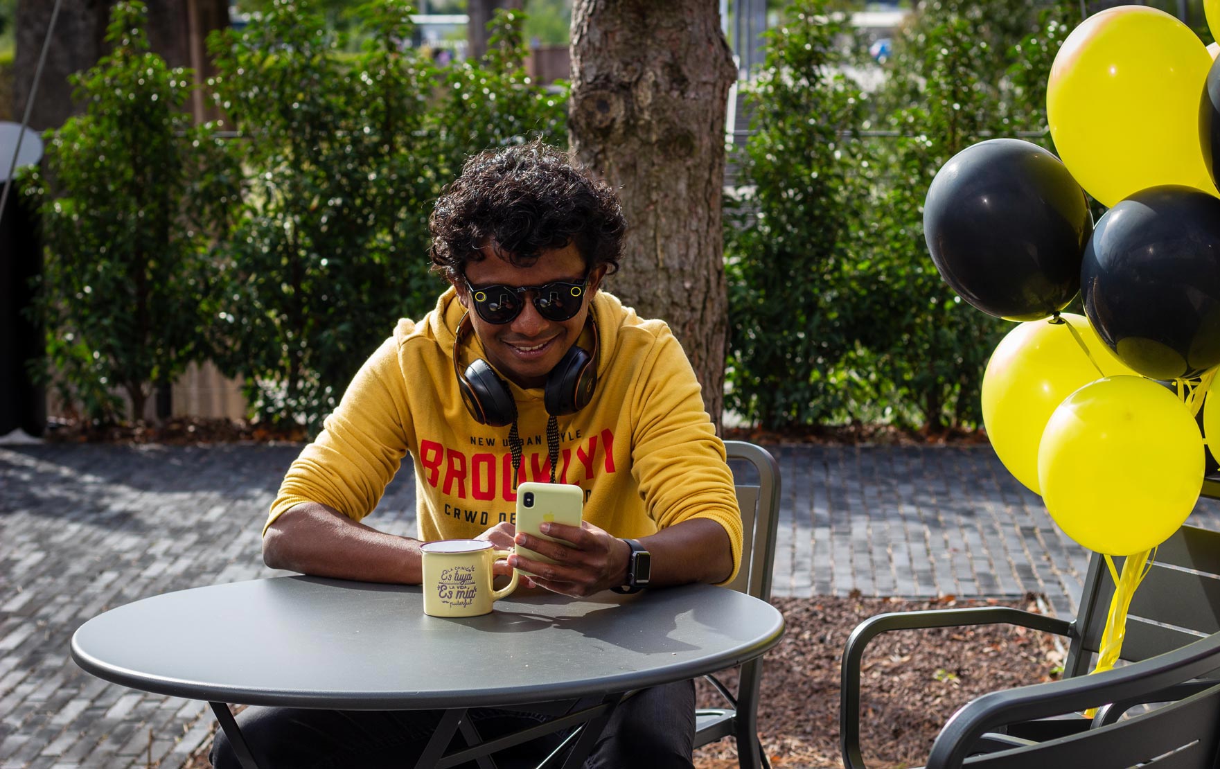 Aswin Lutchanah with balloons outside the Luxembourg Learning Centre in Belval