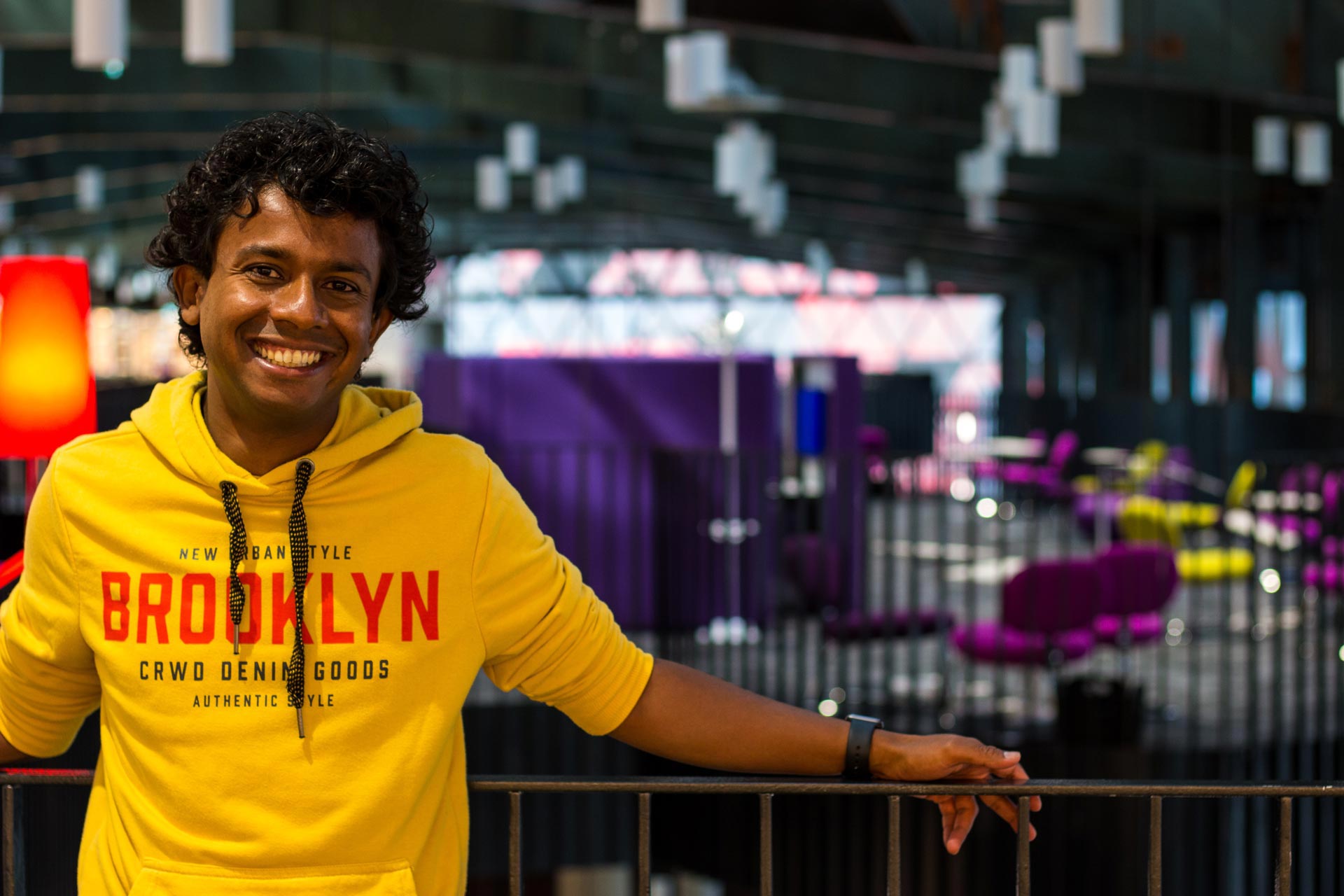 Aswin Lutchanah smiling inside the Luxembourg Learning Centre in Belval